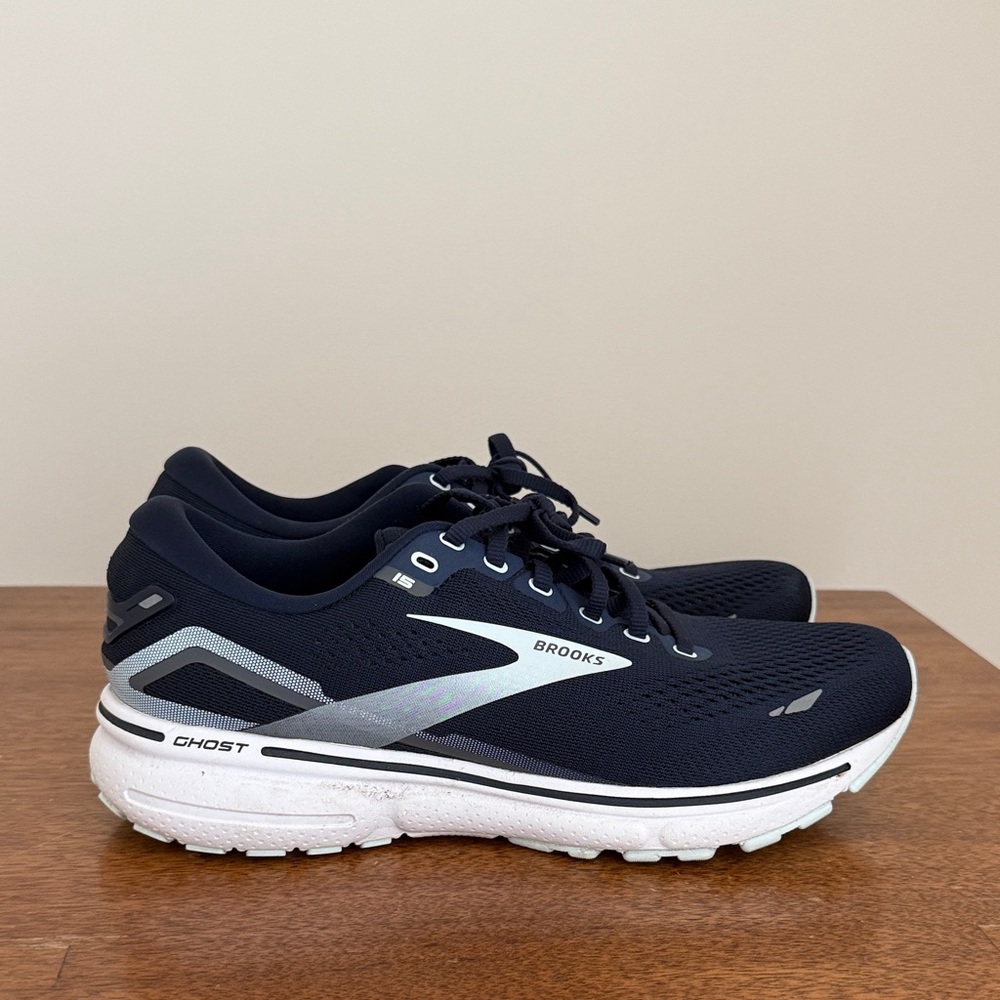 Women’s navy and white Brooks shoes